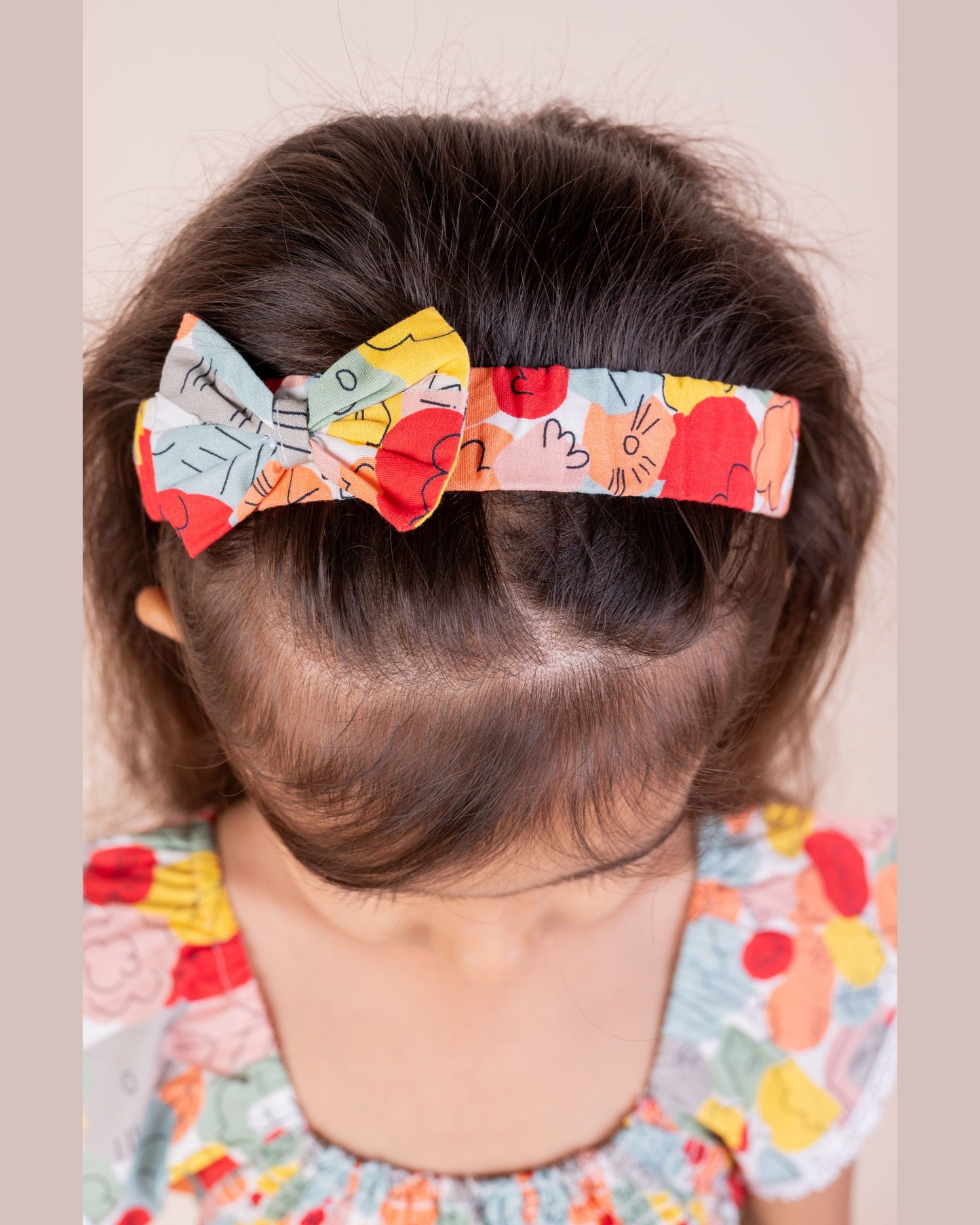 Abstract leaf print frock with hairband