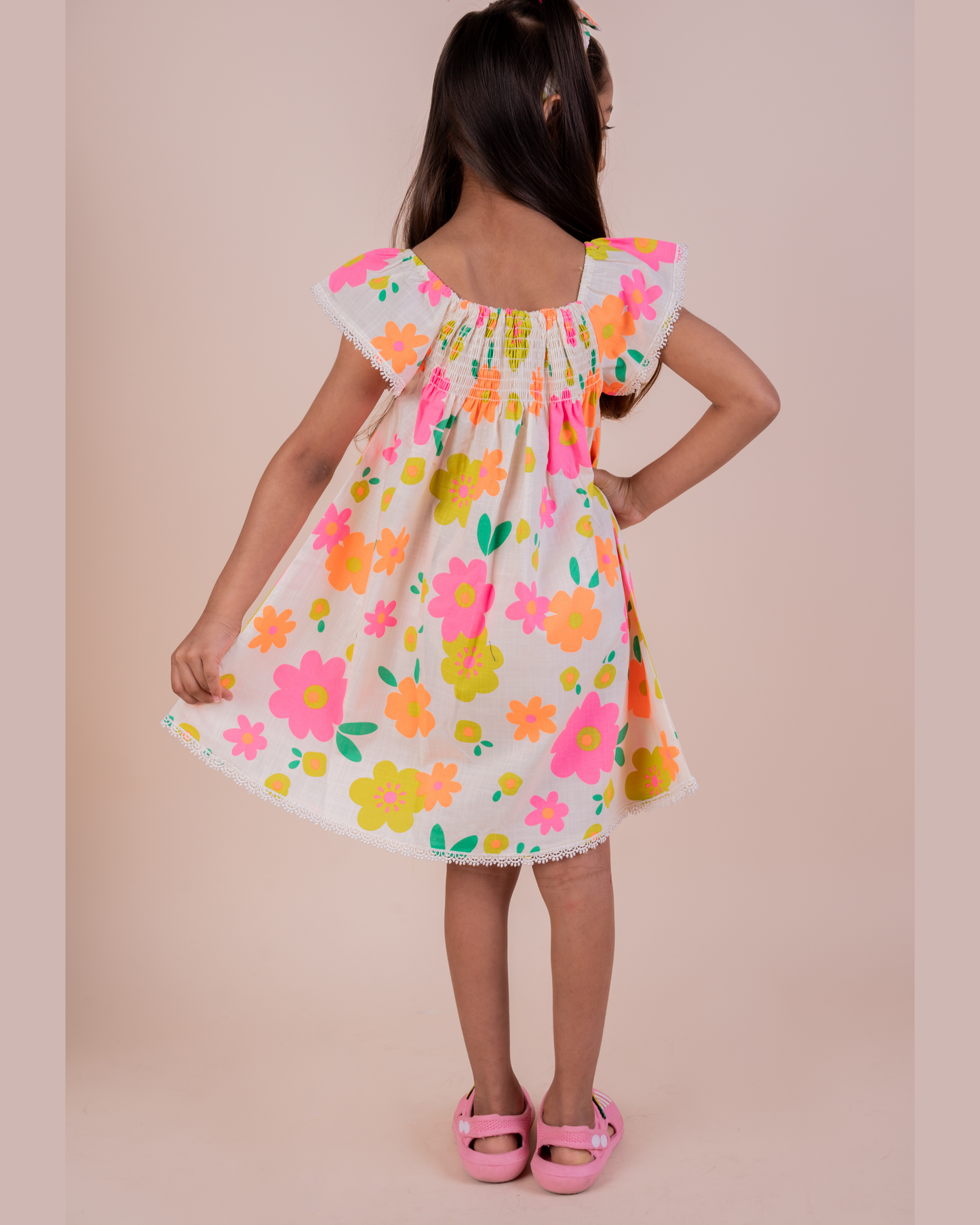 Vibrant Floral print frock with a matching Hairband