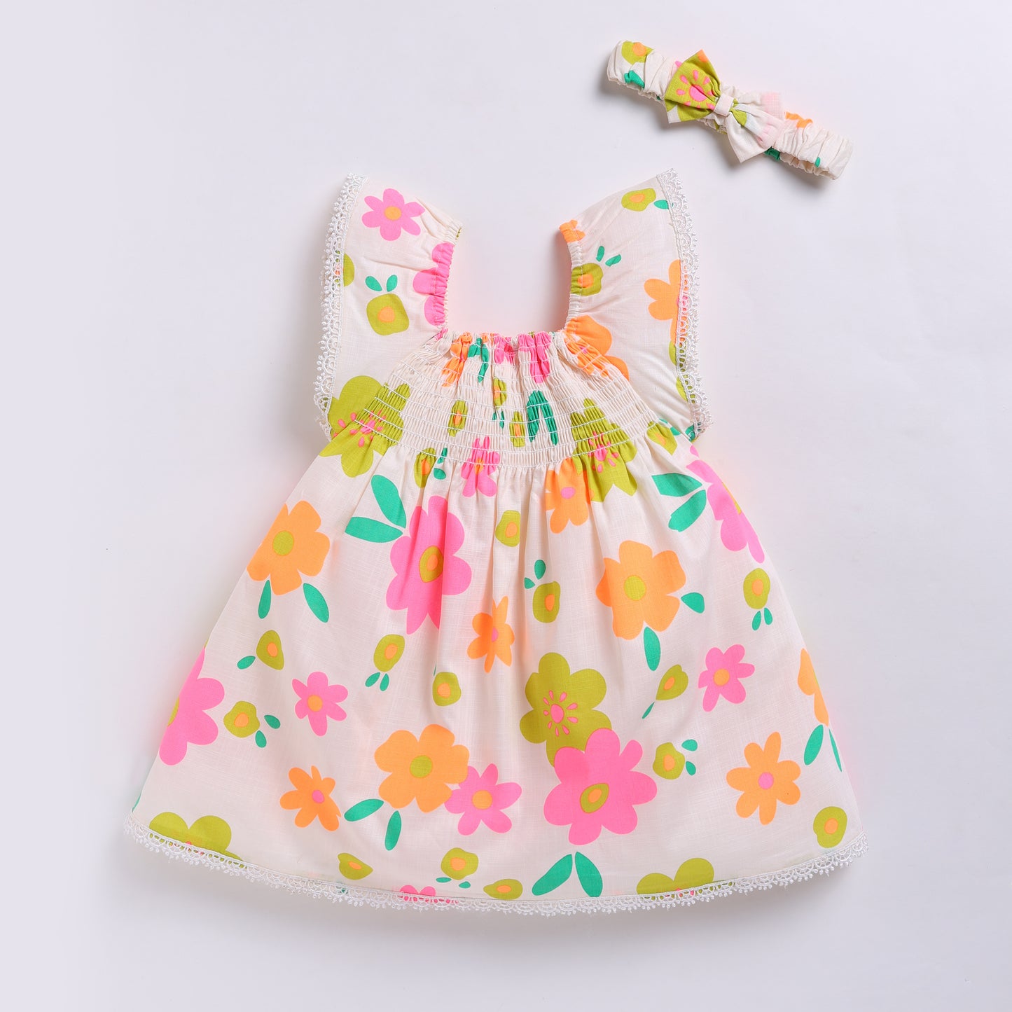 Vibrant Floral print frock with a matching Hairband