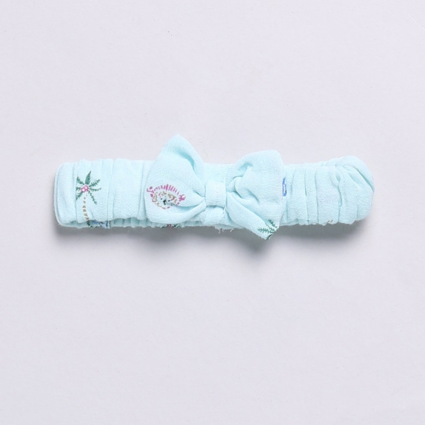 Blue muslin frock with matching hairband