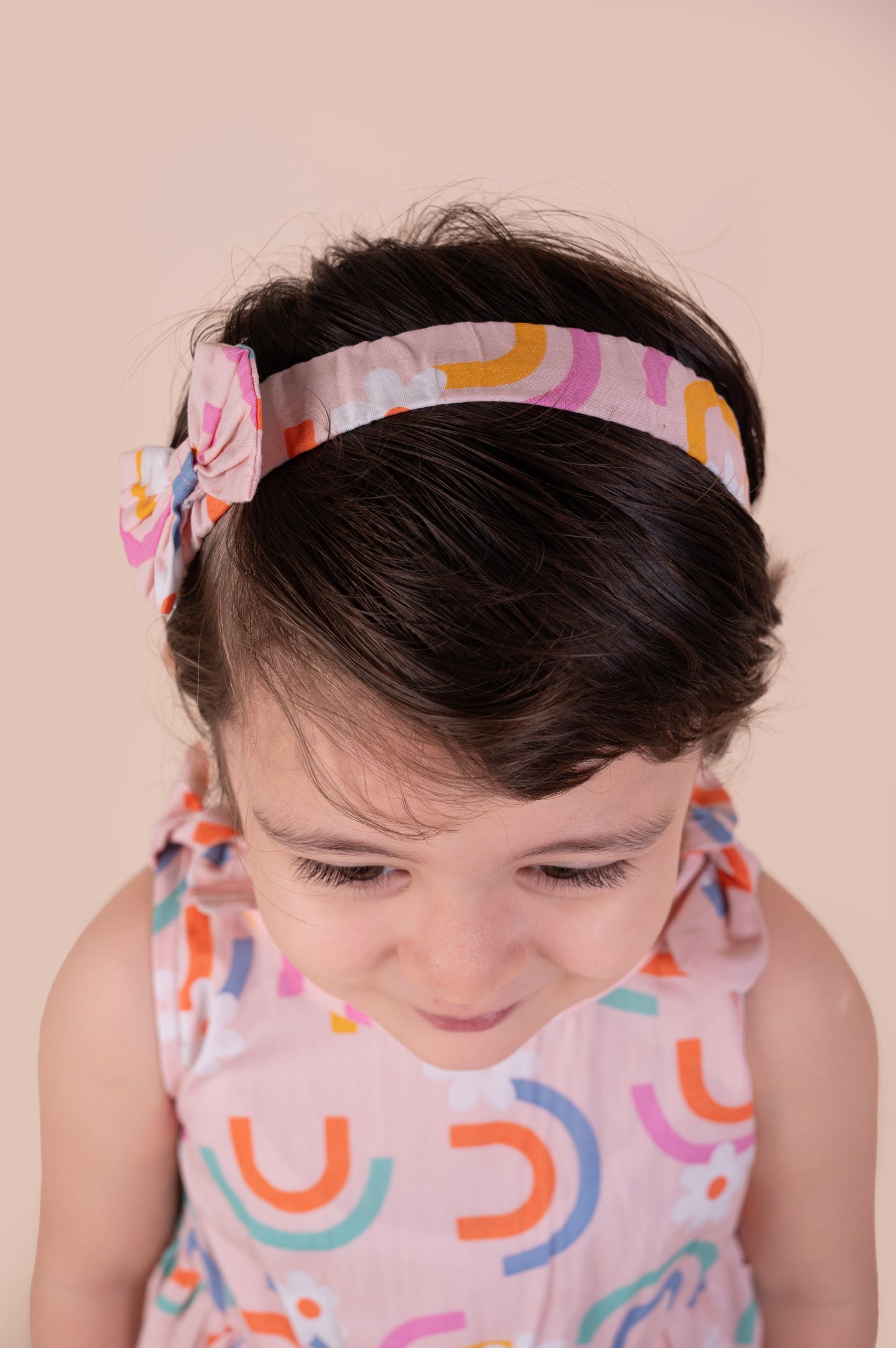 Rainbow Print Sleeveless Frock with matching Hairband