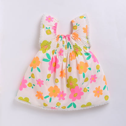 Vibrant Floral print frock with a matching Hairband